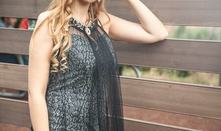 Woman in evening dress in outdoors. Fashionの写真素材