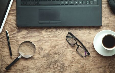 Business objects on wooden desk.の写真素材