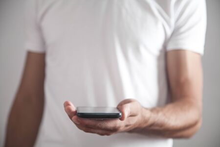 Man holding smartphone. Technology conceptの写真素材