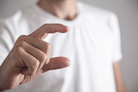 Man fingers to hold something.