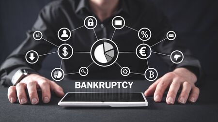 Man with a Bankruptcy text and financial network.の写真素材