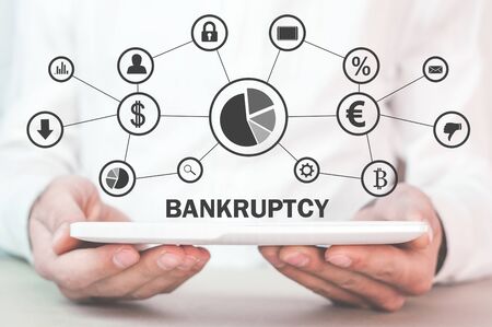 Man with a Bankruptcy text and financial network.の写真素材