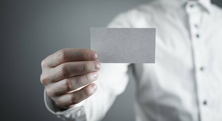 Businessman showing empty business card.の写真素材