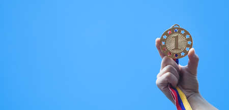 Hand showing medal. Sport, Winner, Successの写真素材