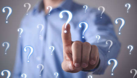 Businessman with question marks. Problem, Solutionの写真素材