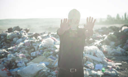 Man in gas mask in outdoors. Stop Environmental Pollutionの写真素材