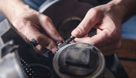 Electrician repairs of vacuum cleaner. Repairing
