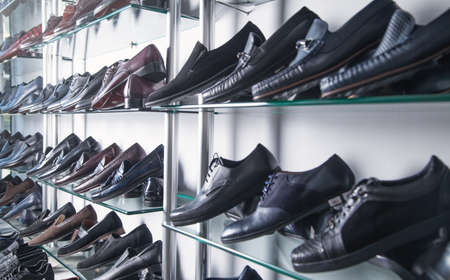Elegant leather male shoes in the store.