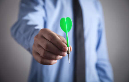 Businessman holding dart. Target, Businessの写真素材
