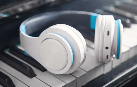 Headphones on the piano keyboard. Musicの写真素材
