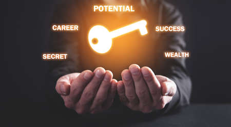 Man showing key with a words. Key to successの写真素材