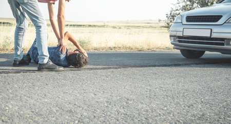 Car driver helping accident victim. People, Life, Car drivingの写真素材