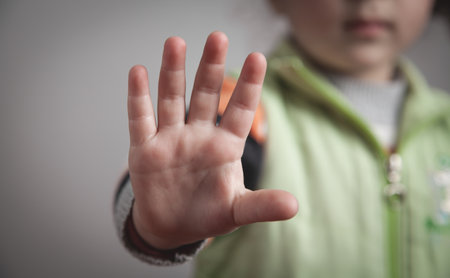 Caucasian little girl making stop gesture.の写真素材