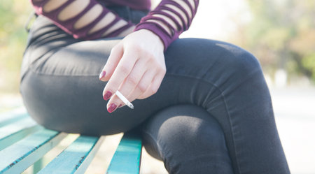 Woman with cigarette. Smoking, lifestyleの写真素材