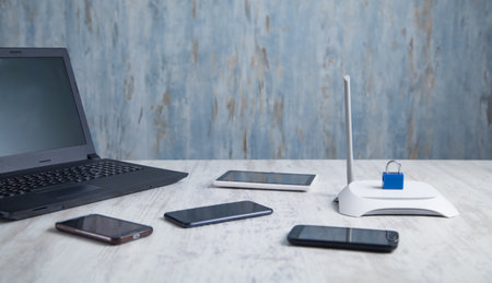Padlock with smartphones, internet router, laptop. Securityの写真素材