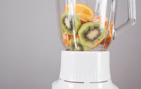 White blender with fresh fruits. mixingの写真素材