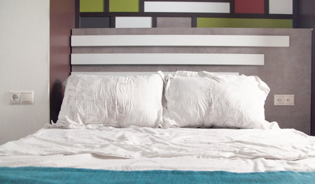 Comfortable pillows on the bed. Bed interior