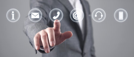 Man touching Contact symbols. Internet. communicationの写真素材