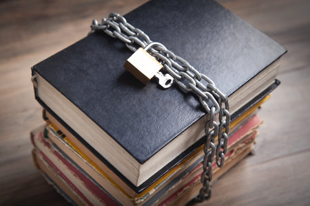 Book with chain and padlock. information securityの写真素材