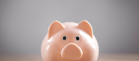 Piggy bank on the desk. Saving. business