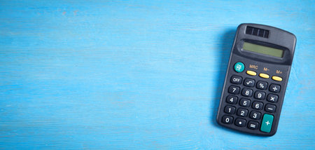 Calculator on the blue background.