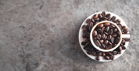 Cup of coffee and coffee beans.