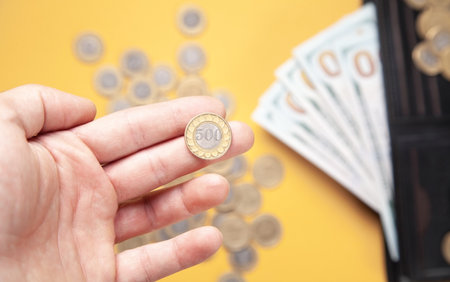 Male hand showing coin. business. Financeの写真素材
