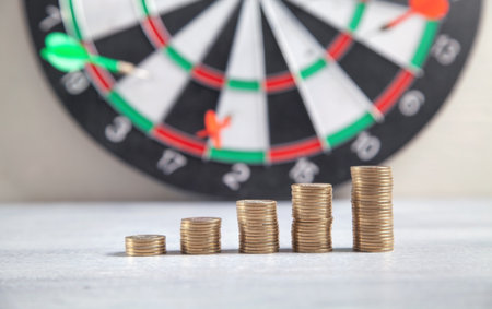 Coins and target dartboard. business strategy. Achievement. Goalsの写真素材