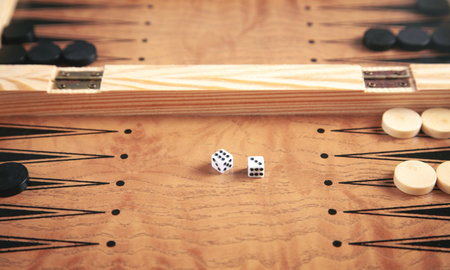 Figures with dice. wooden backgammon board game