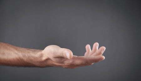 Caucasian man showing empty hand.の写真素材