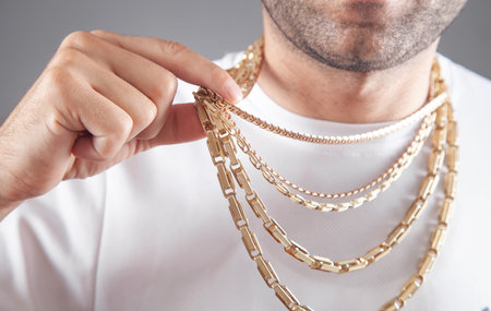 Man with a expensive necklace. fashion accessories and jewelryの写真素材