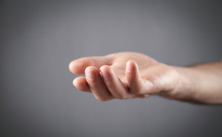 Caucasian man showing empty hand.の写真素材