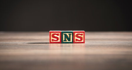 Word SNS on wooden cubes.