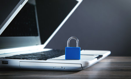 Padlock on the laptop keyboard. Internet and computer security