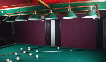 Billiard room interior. Green table for game