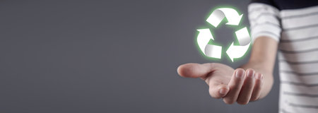 Caucasian man holding Recycle symbol.の写真素材