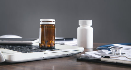 Pills bottles on the medical table.の写真素材