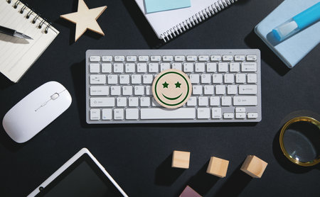 Happy smiley on wooden round with a business objects. customer satisfactionの写真素材