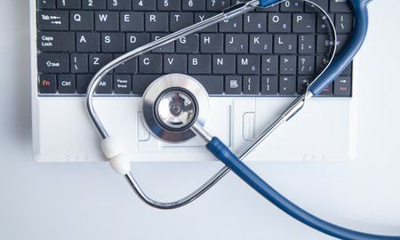Stethoscope on computer keyboard. Medical. technology