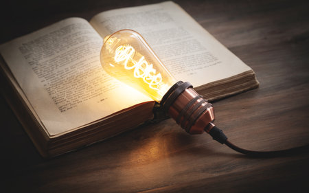 Light bulb and book. knowledge and wisdomの写真素材