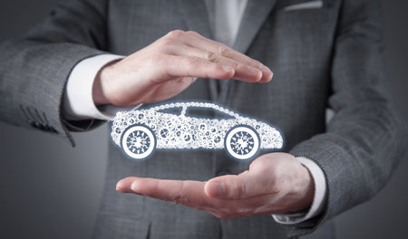 man protect car model. car insuranceの写真素材