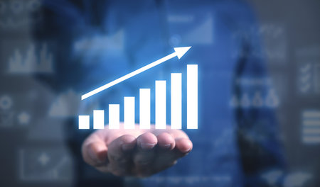 Businessman with a growth graph. business. Development. successの写真素材
