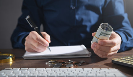 Businessman with a dollar money. finance. investmentの写真素材
