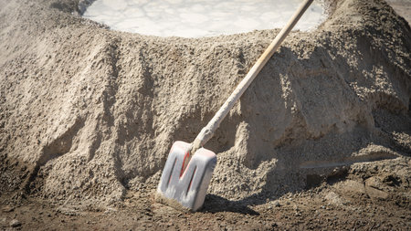 Shovel with a cement. construction site