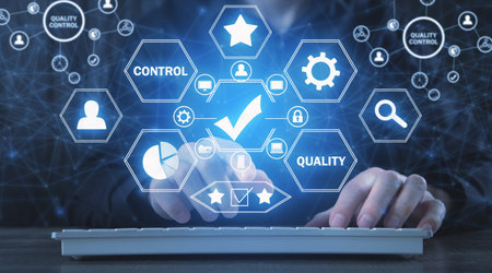 working on computer. Quality control, Guarantees, Standardsの写真素材