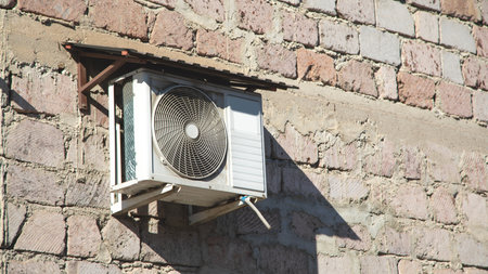 Air conditioner compressor on the wall.の写真素材