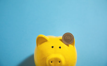 Piggy bank with coins. concept of savingの写真素材