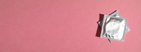 Condom on the pink background. Space for your textの写真素材