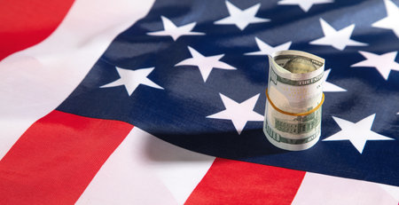 Dollar banknote and USA national flag.
