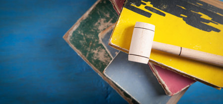 Judge gavel and book on the blue background.の写真素材